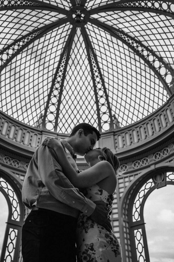 a couple kisses in the gazebo at Miami Vizcaya Museum and Gardens
