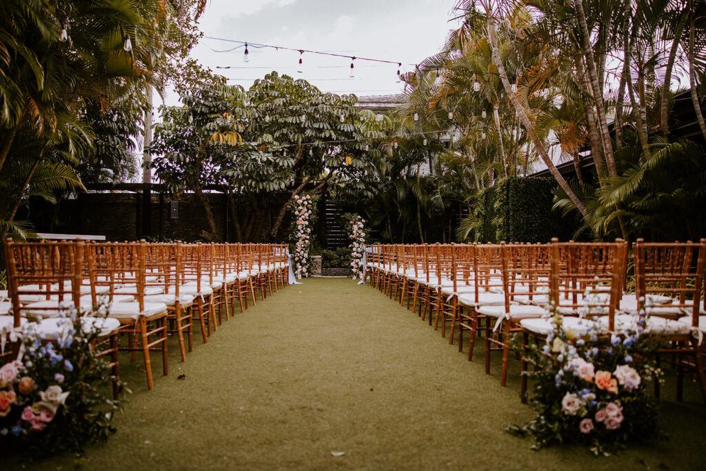a ceremony set up with many chairs for a luxury wedding in miami