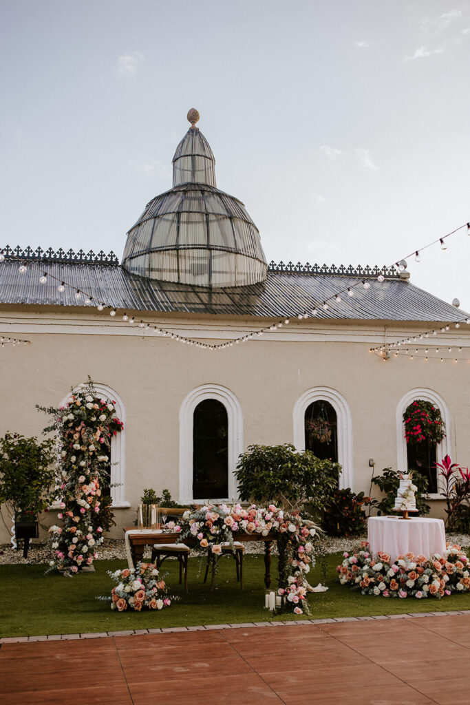 a head table + cake set up at a luxury wedding venue in Miami florida