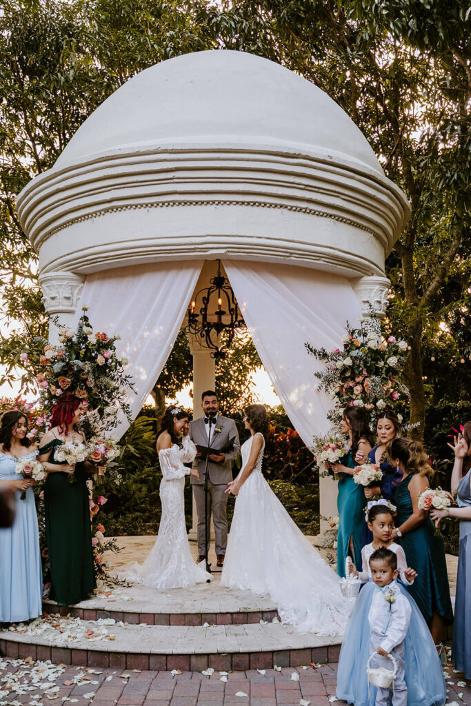 two brides at their ceremony at Villa Toscana in Miami florida