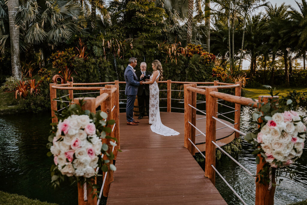 a bride and groom exchange vows at a venue in homestead florida