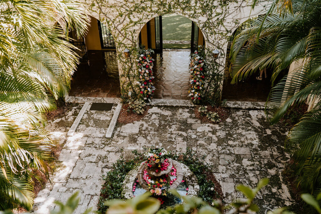 a birds eye view of the ceremony space in the courtyard of Villa Woodbine in Miami, fl