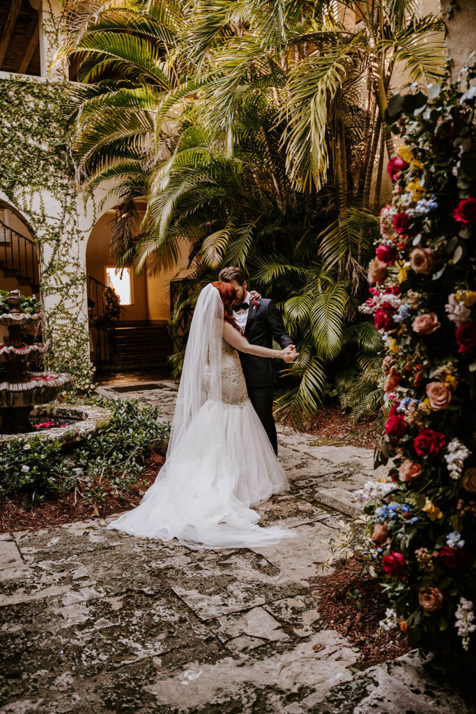 a couple has their first dance on their wedding day