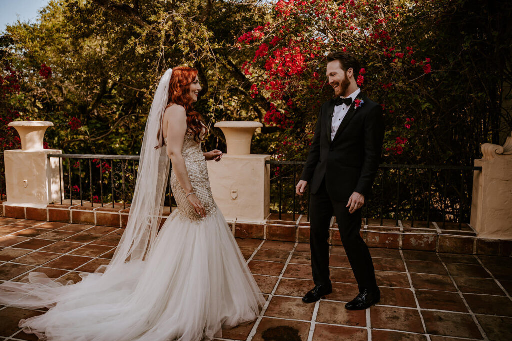 a groom sees his bride for the first time during their first look