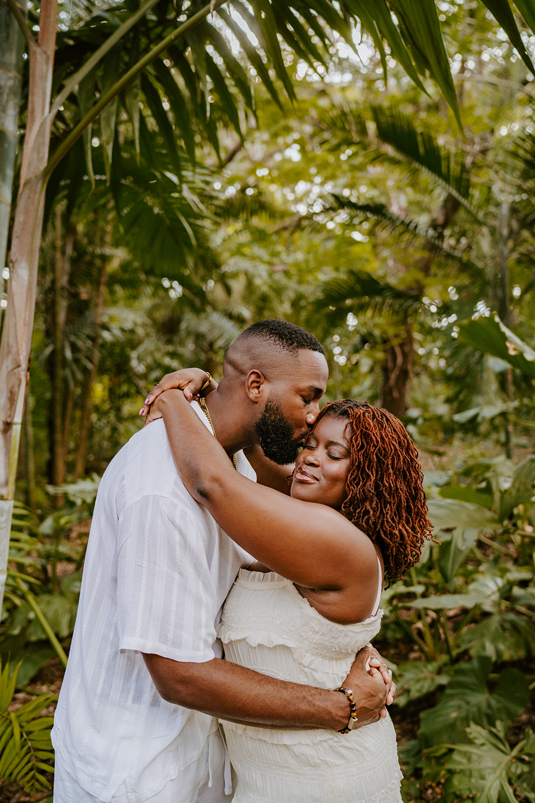 man and woman at Fairchild Tropical Botanic Garden engagement shoot