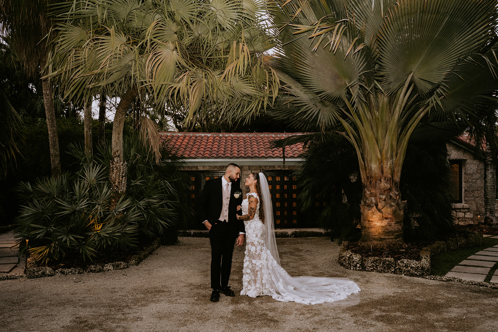 Bride and groom in front of The Cooper Estate
