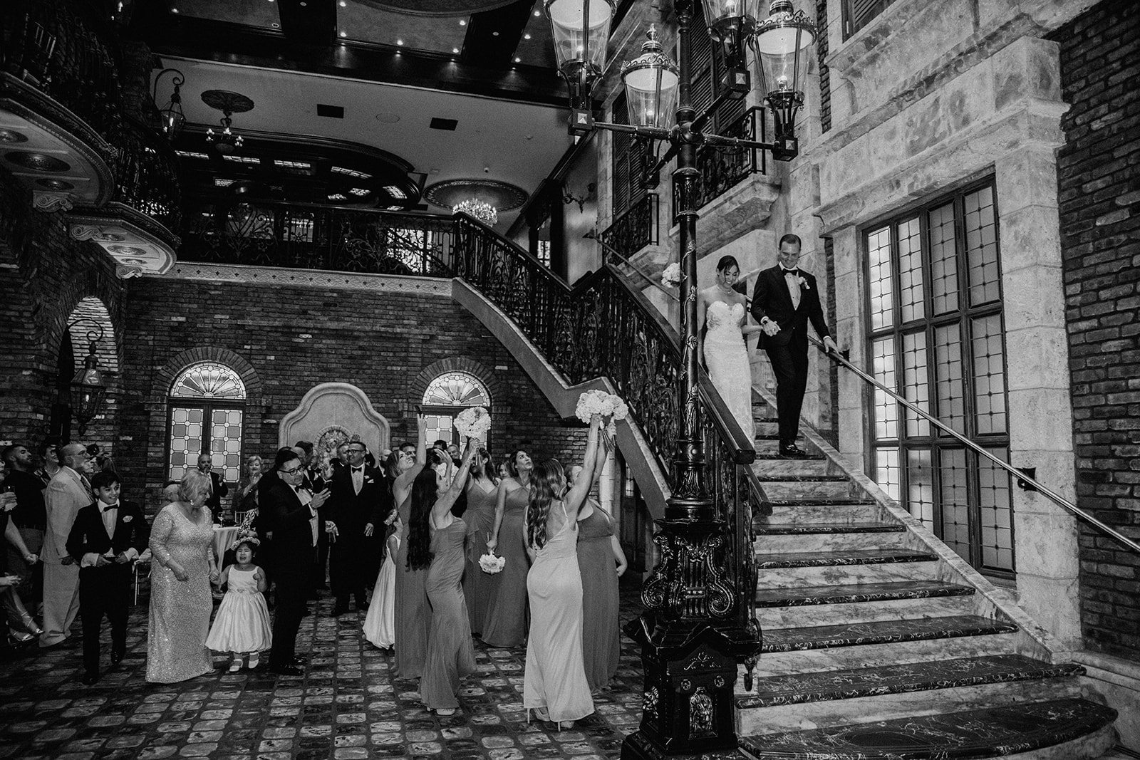 Bride and groom have their Cruz Building wedding entrance