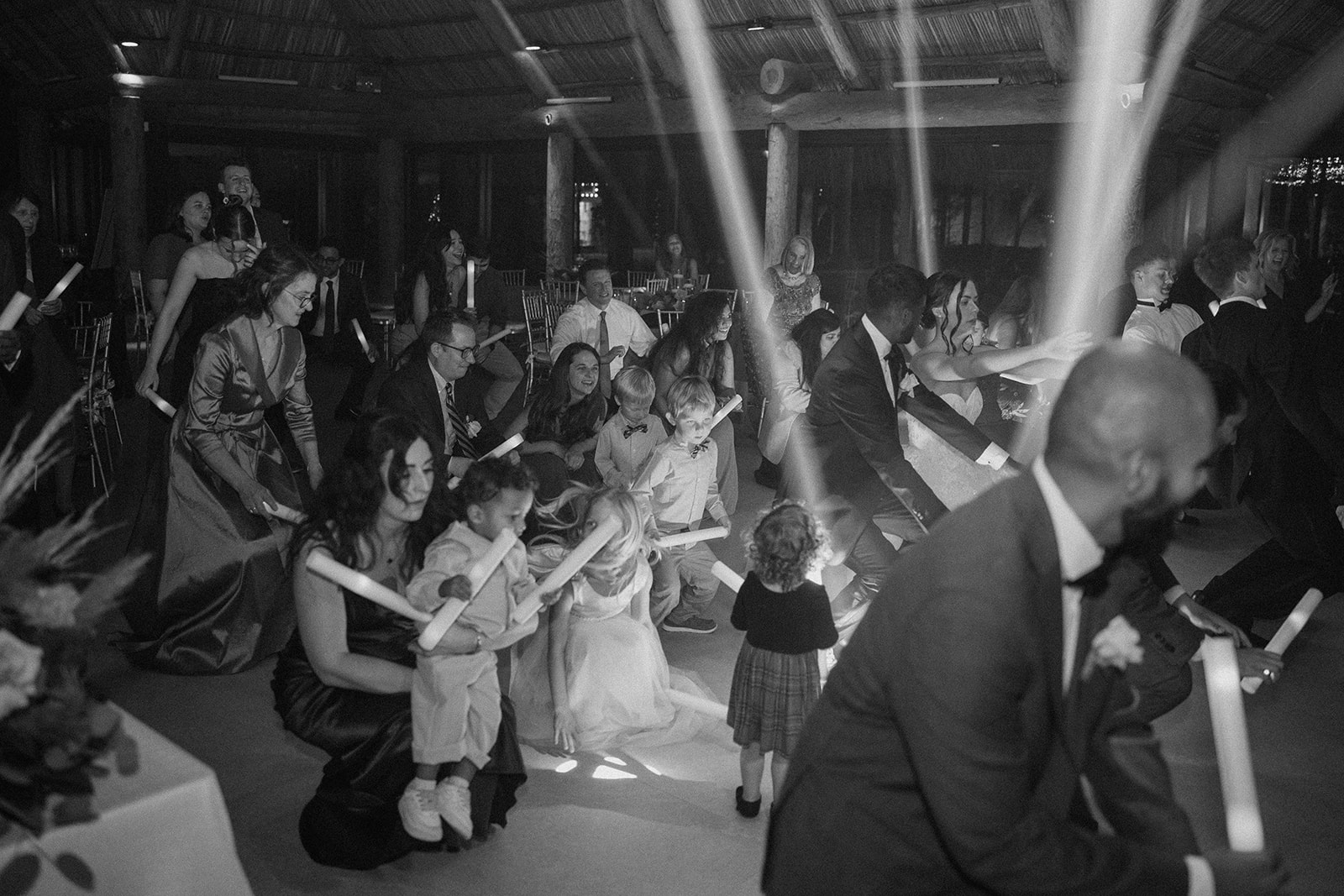 Wedding guests dance at The Barn 305 wedding reception