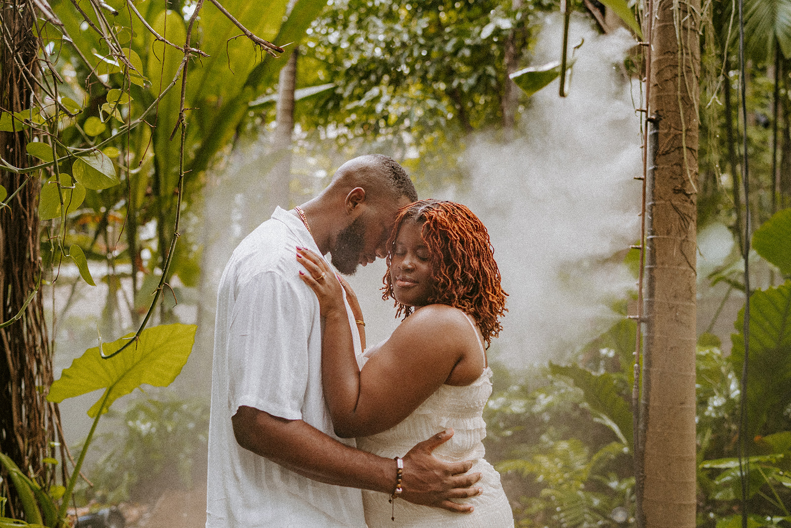 Couple embraces at their Fairchild Tropical Botanic Garden engagement photos