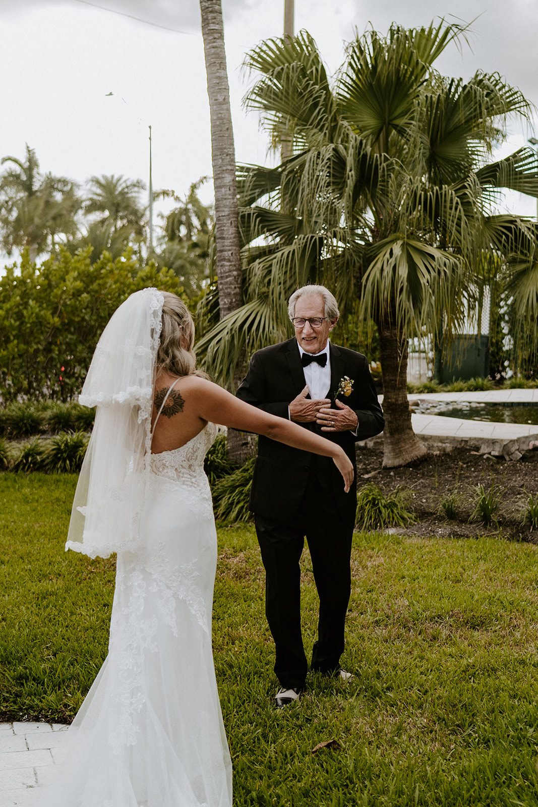 Bride and father have first look at Vignette Gardens wedding