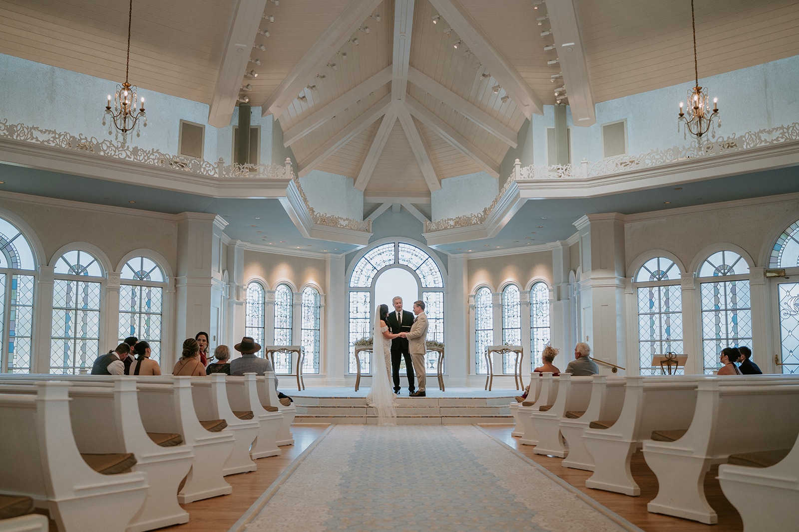 Bride and groom say their vows at their Walt Disney World wedding